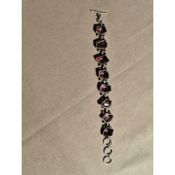 zilveren armband met paarse steentjes